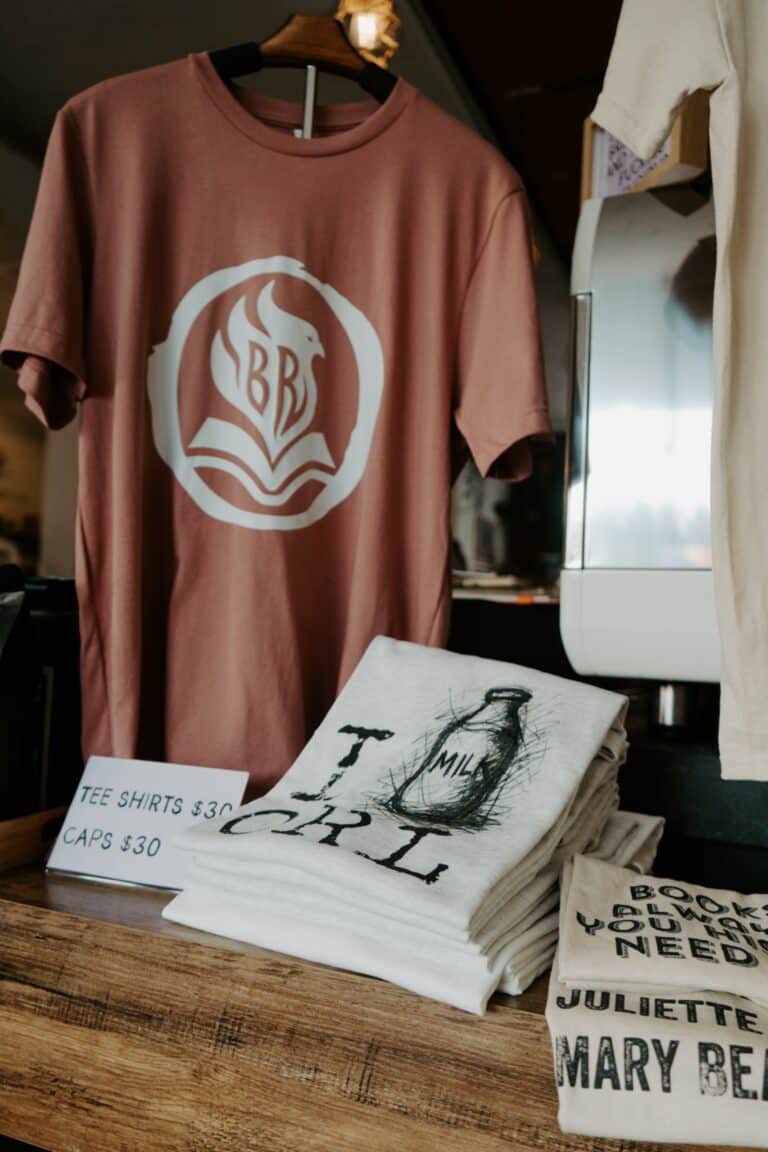 BookBurn Cafe and Social merchandise including logo t-shirts displayed inside the café in Orlando’s Milk District.