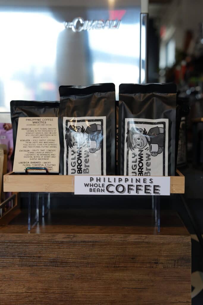 Philippine whole bean coffee bags displayed at BookBurn Cafe and Social in Orlando