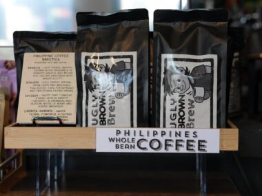 Philippine whole bean coffee bags displayed at BookBurn Cafe and Social in Orlando