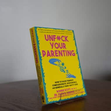 Unf*ck Your Parenting book displayed on a table at BookBurn Cafe and Social