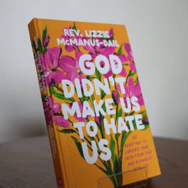God Didn’t Make Us to Hate Us book displayed on a table at BookBurn Cafe and Social