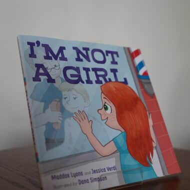 I’m Not a Girl children’s book displayed on a table at BookBurn Cafe and Social